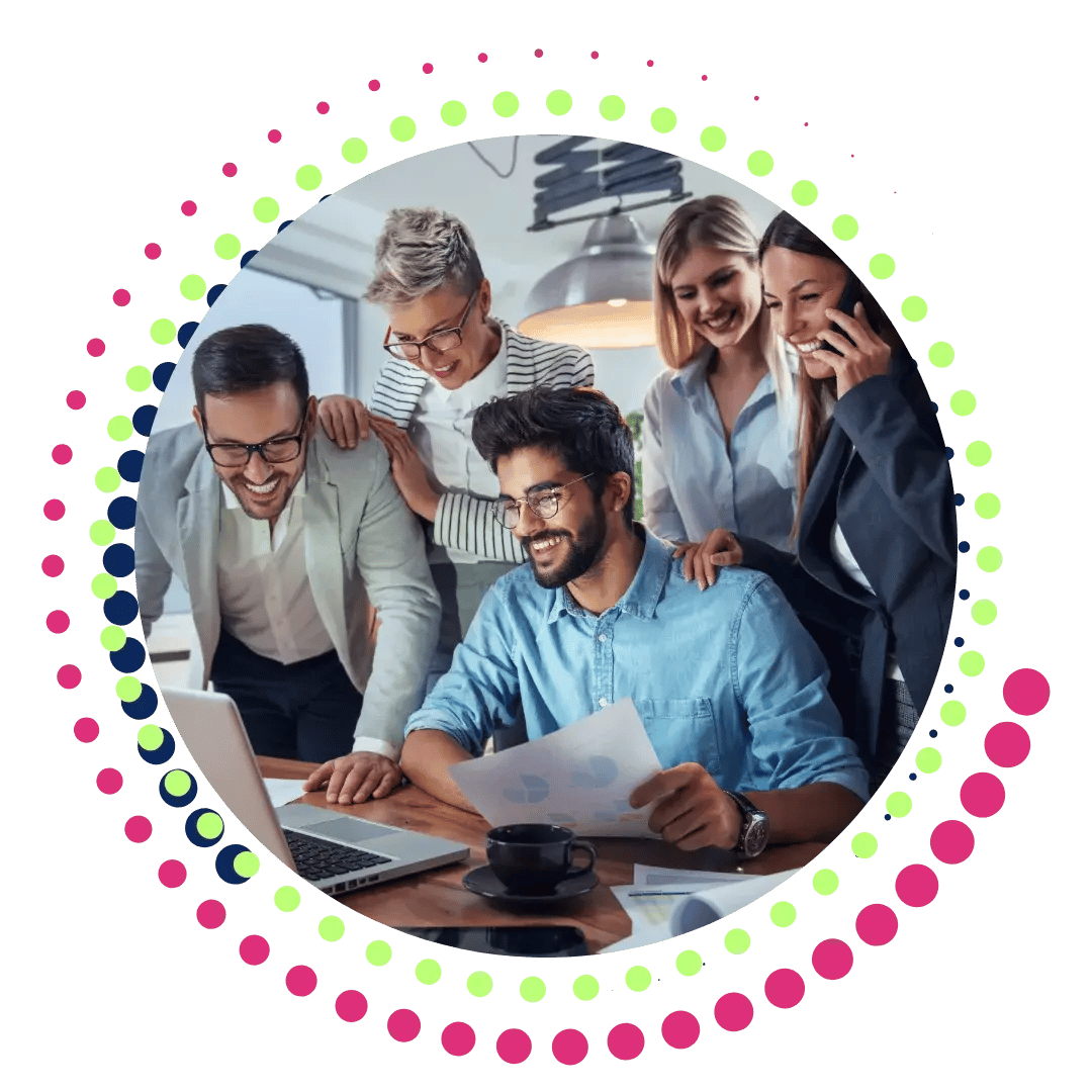 A diverse group of people collaborating around a laptop, sharing ideas and working together on a project